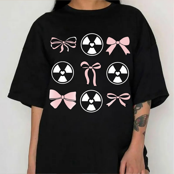 Y2K Graphic T-Shirt with pink bows and radioactive heart design on black oversized tee.