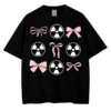 Y2K Graphic T-Shirt with pink bows and radioactive heart design on black oversized tee.